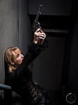 The lovely LaRae Lobdell (from CreativeLive.com) sporting a gun. A big gun.
